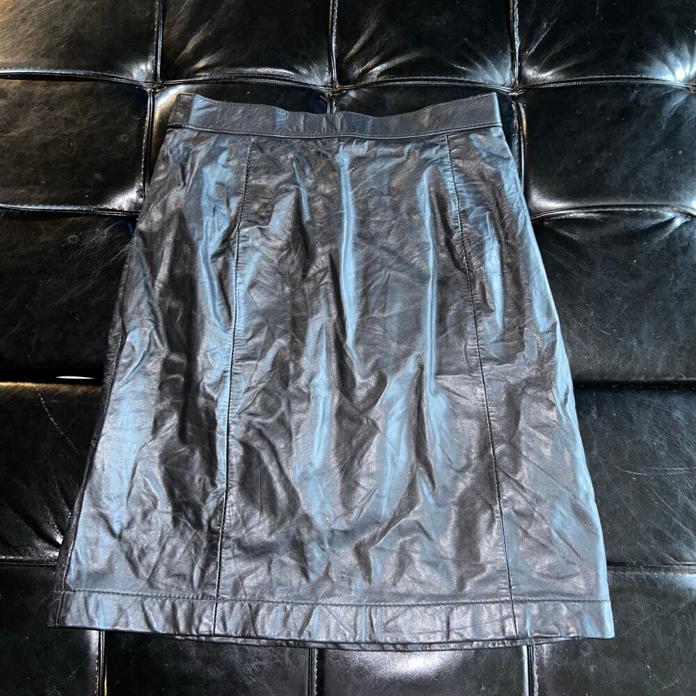 Vintage Wilson leather size 8 miniskirt fits like XS black goth